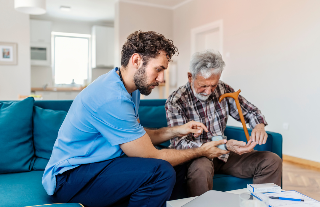 Home healthcare nurse helping a patient manage chronic conditions at home